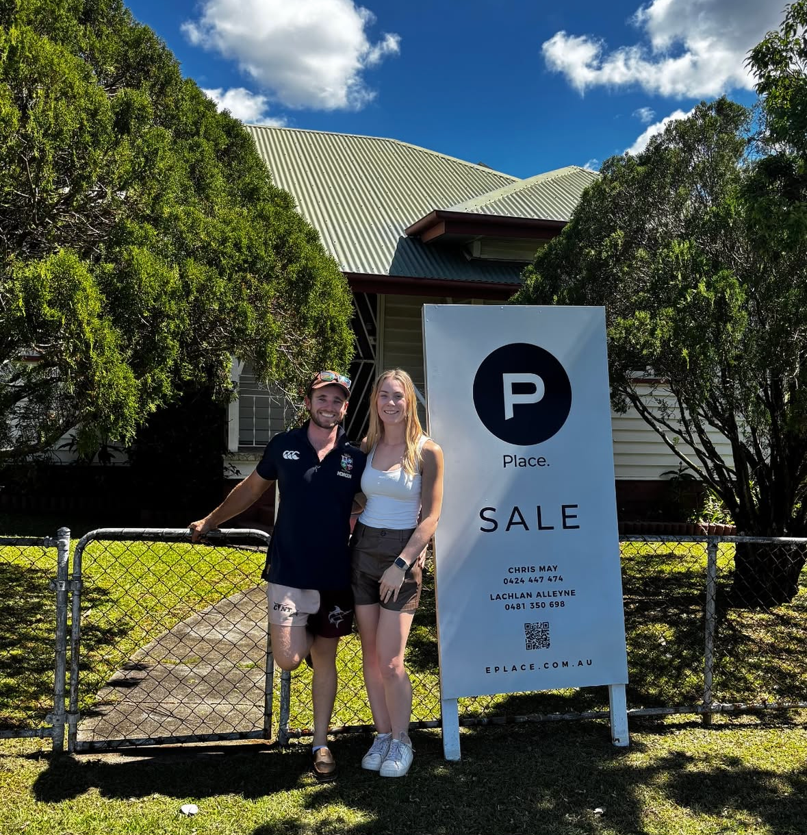 Happy buyers celebrating their new home purchase