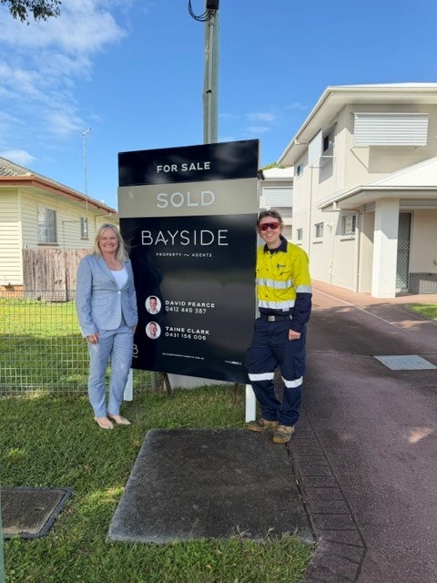 Alecia Zillman with happy clients at their new Brisbane property