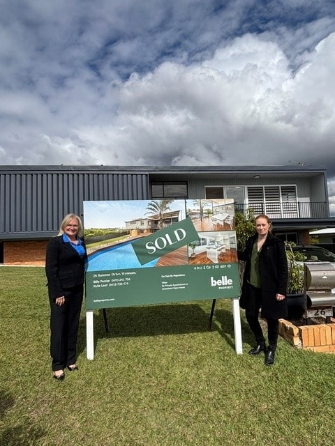 Alecia Zillman celebrating with clients at their new Brisbane home